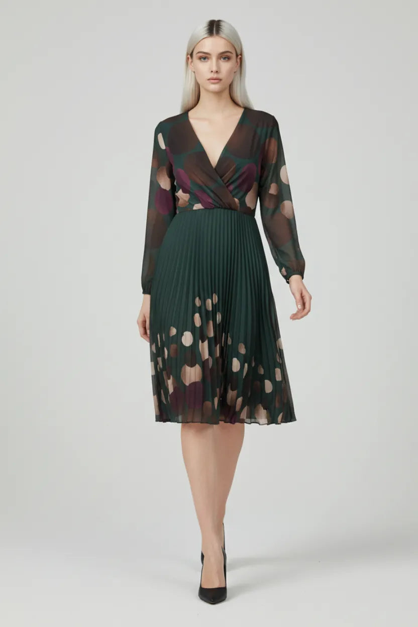 Green pleated midi dress with spotted print