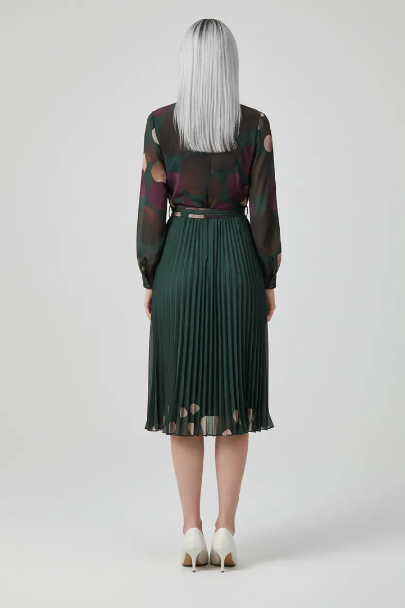 Green pleated midi dress with spotted print