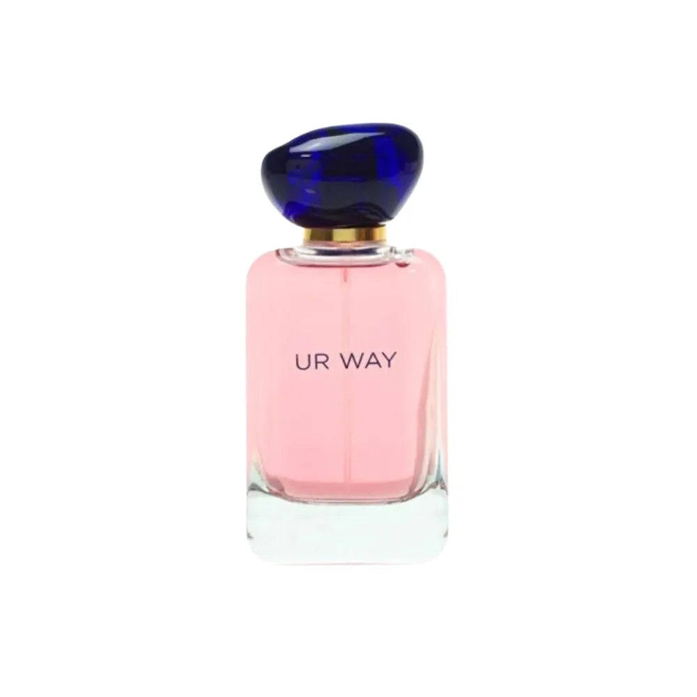 Perfume bottle with pink body and blue cap on a white background