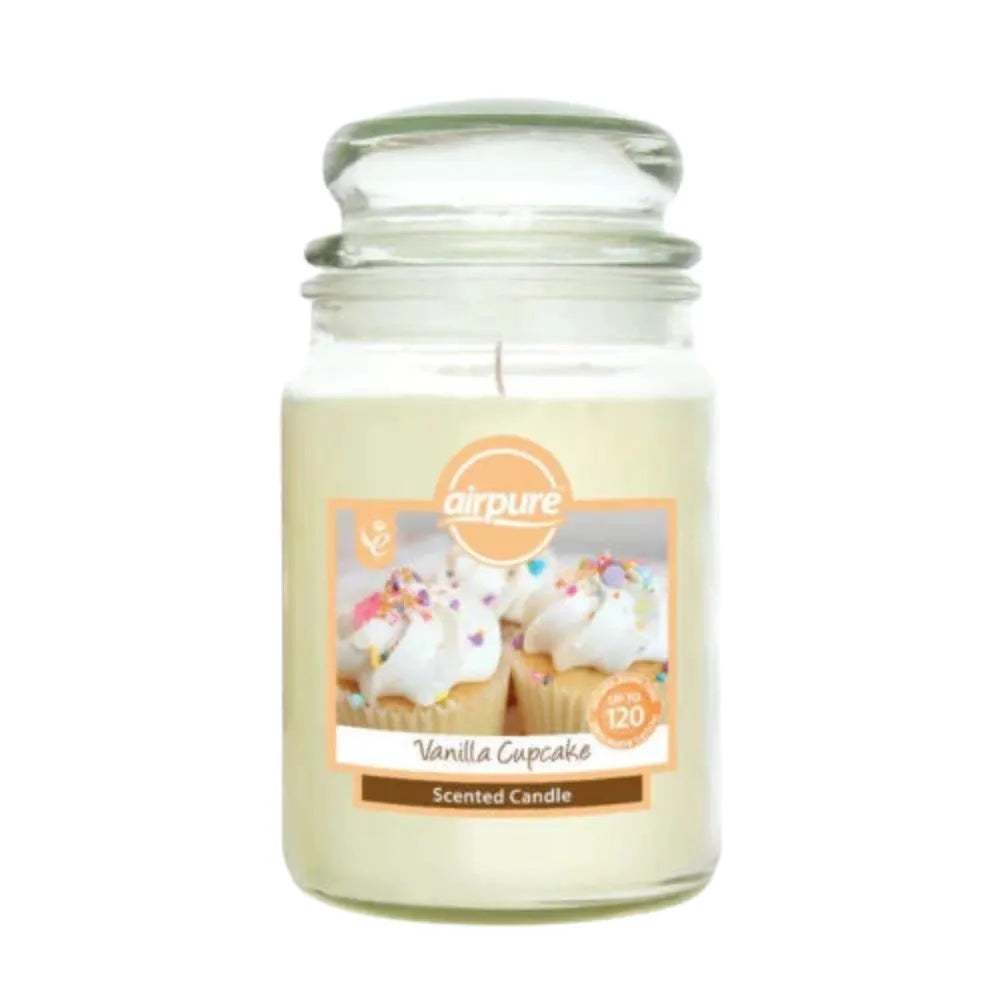 Scented candle in a glass jar with a vanilla cupcake label on a white background