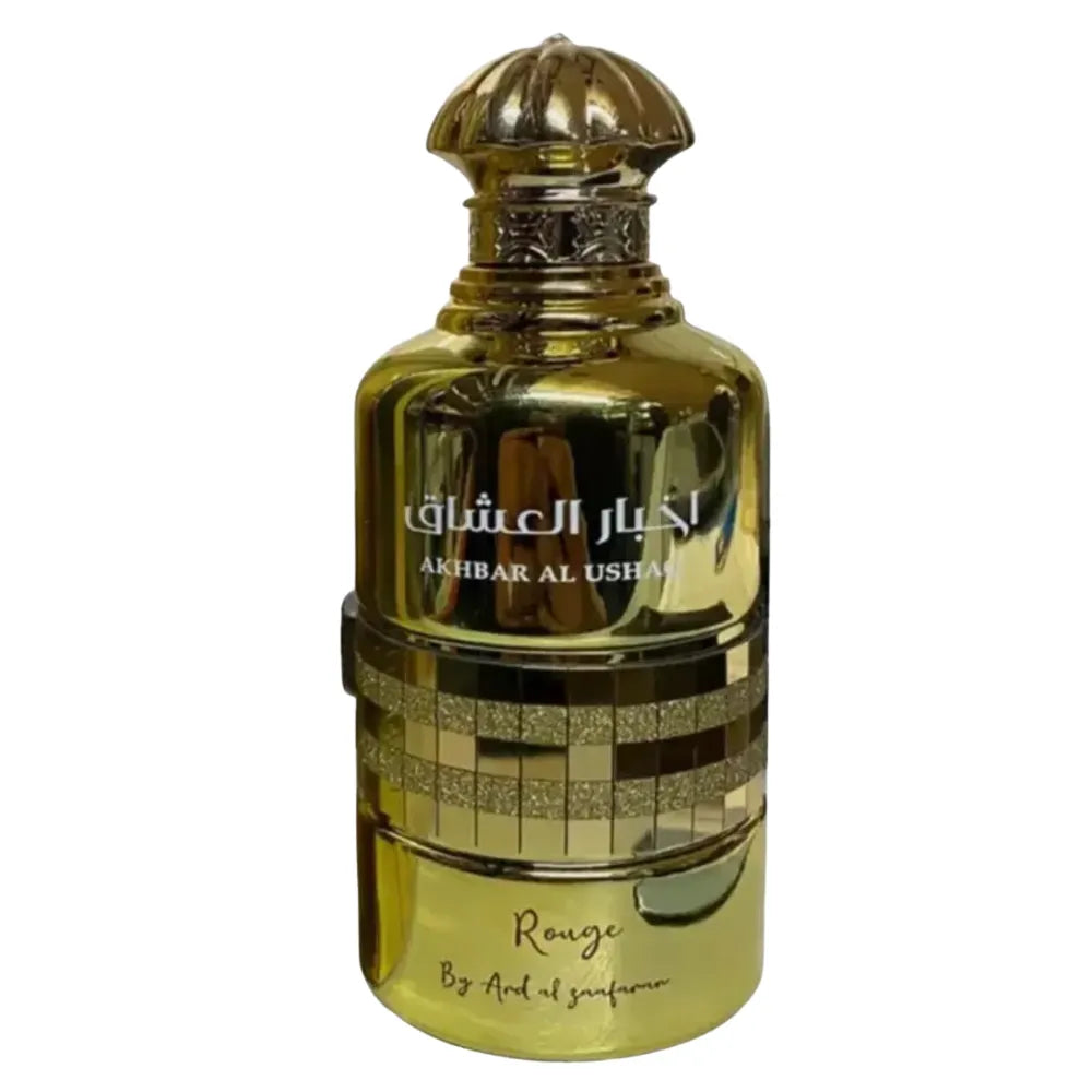 Gold perfume bottle with decorative cap on a white background