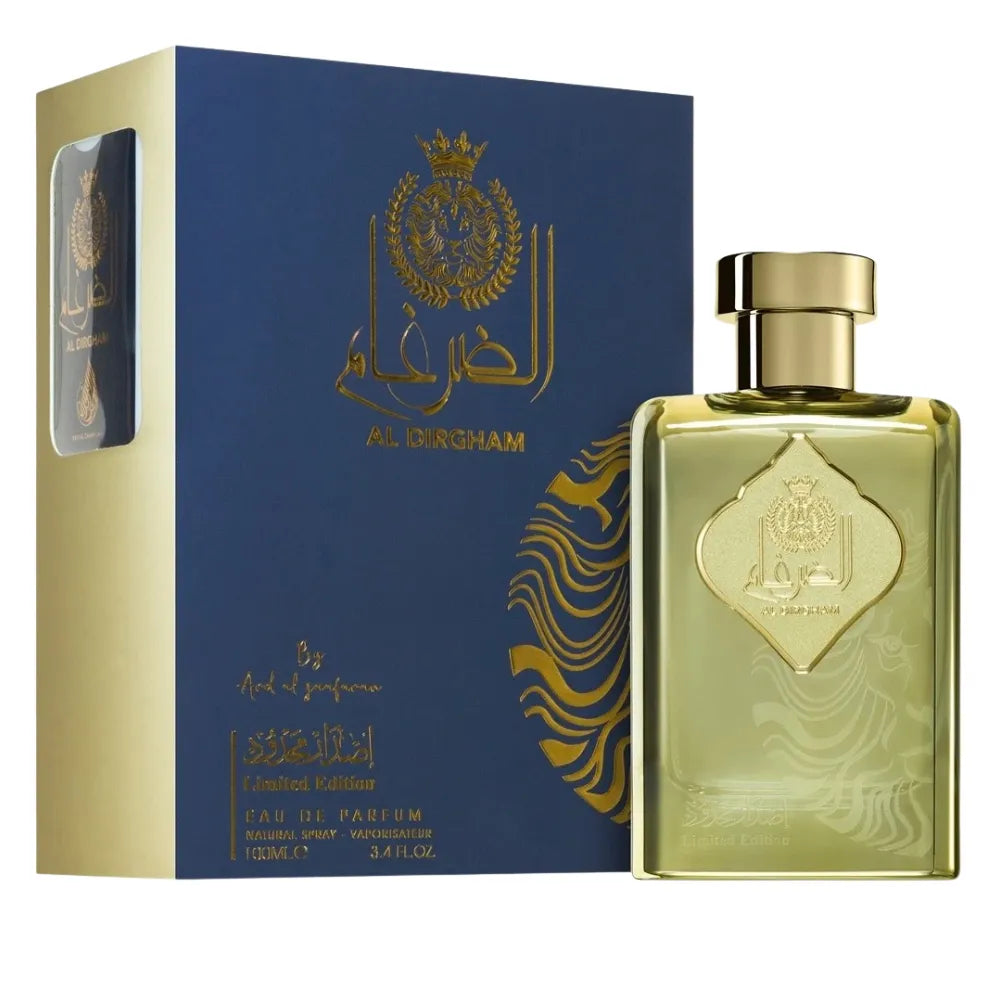Gold and blue perfume bottle and packaging with intricate designs on a white background