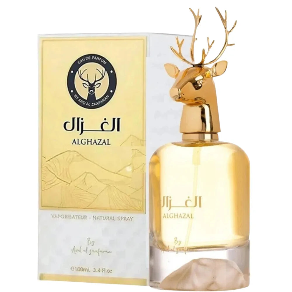 Gold Alghazal perfume bottle with deer design and packaging on a white background