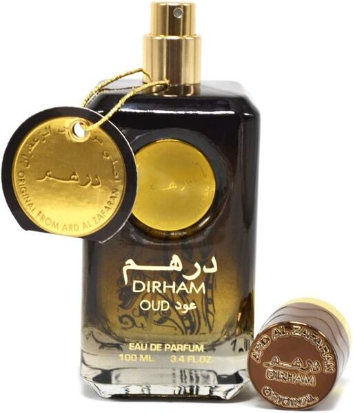 Dirham Oud perfume bottle with gold cap and label on a white background