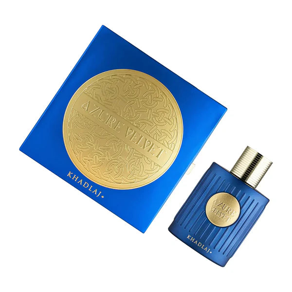 Blue perfume bottle with gold cap and decorative box on a white background