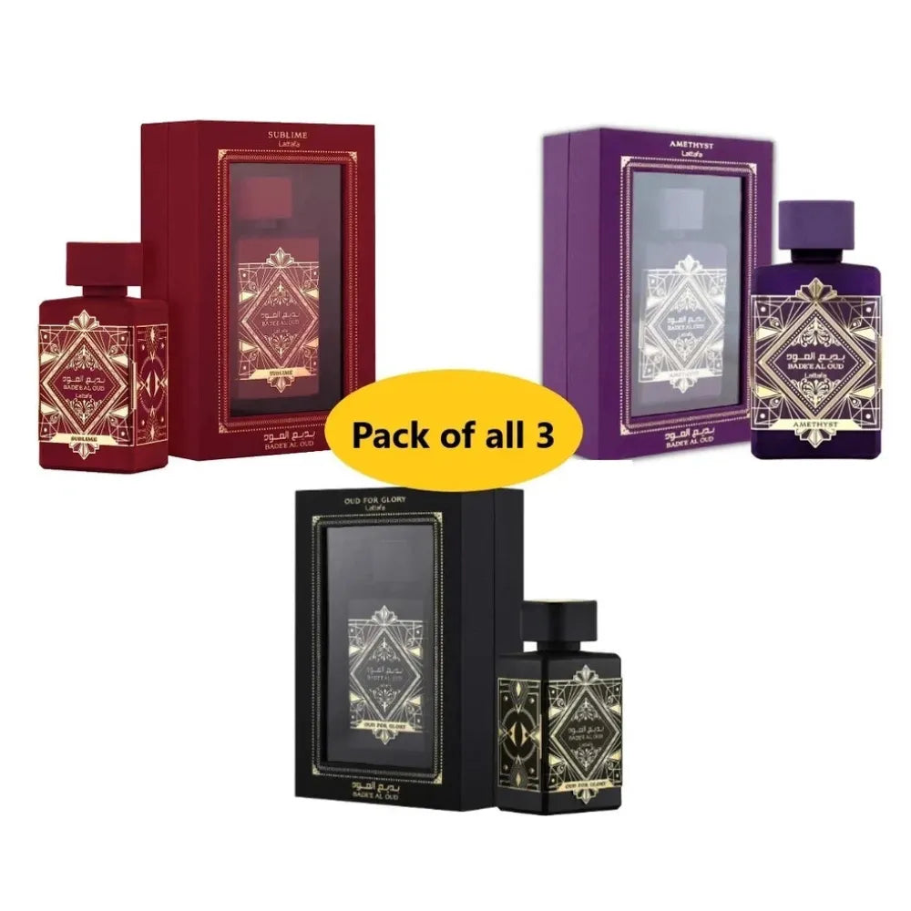 Set of three perfume bottles with packaging on a white background