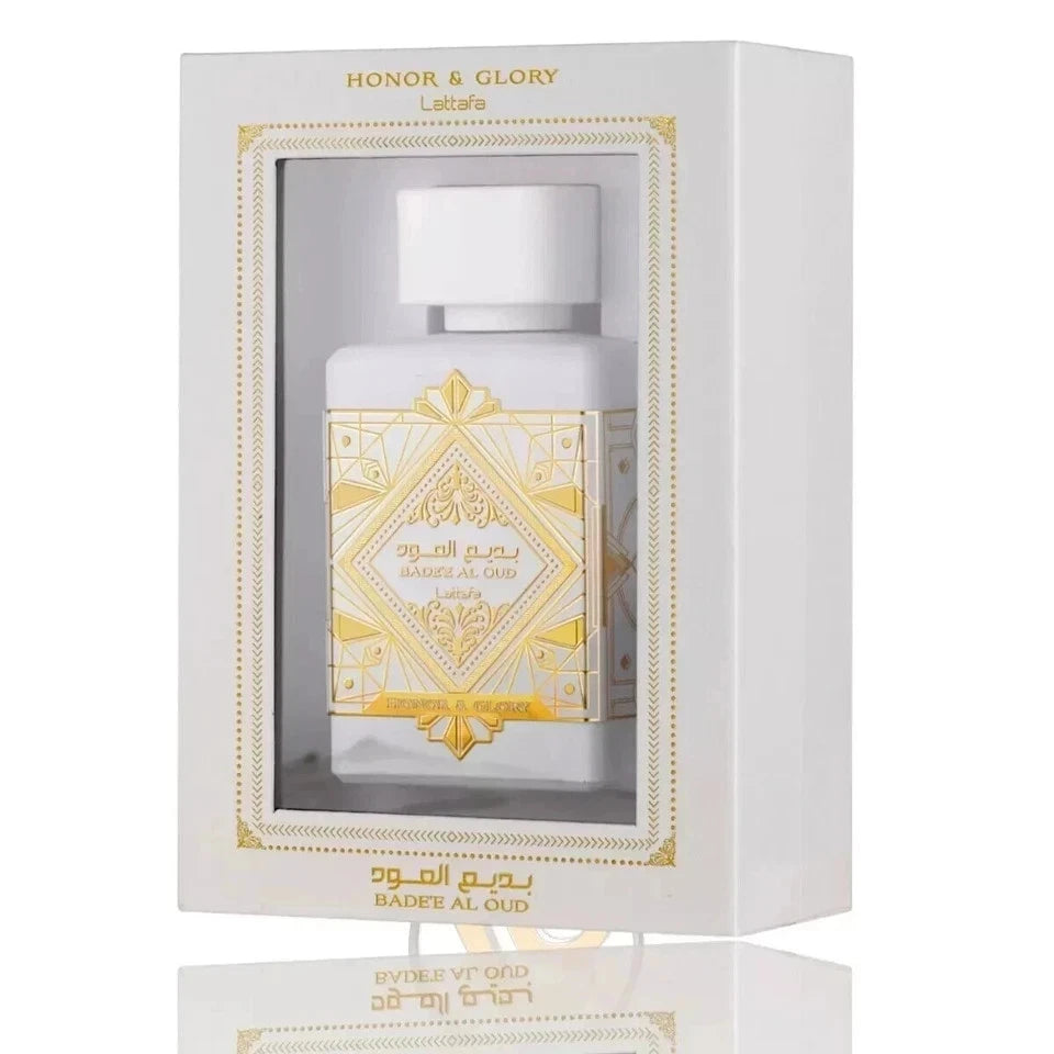 Perfume bottle with gold designs in a white box labeled 'Honor & Glory'.