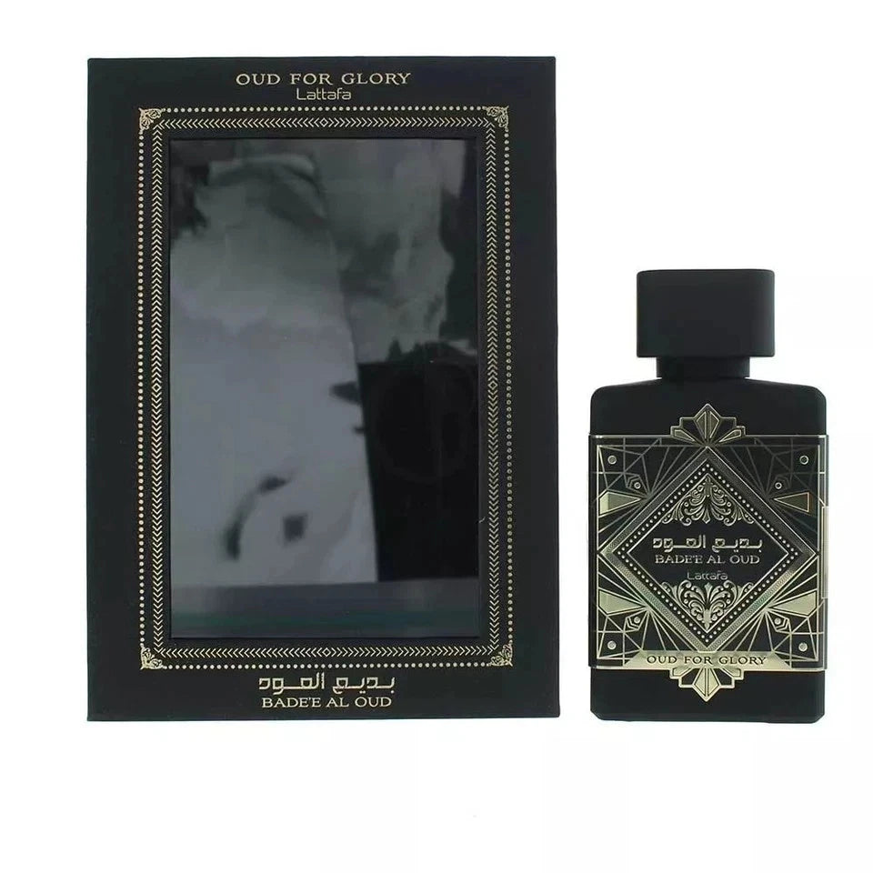 Perfume bottle and packaging with 'Oud for Glory' branding on a white background