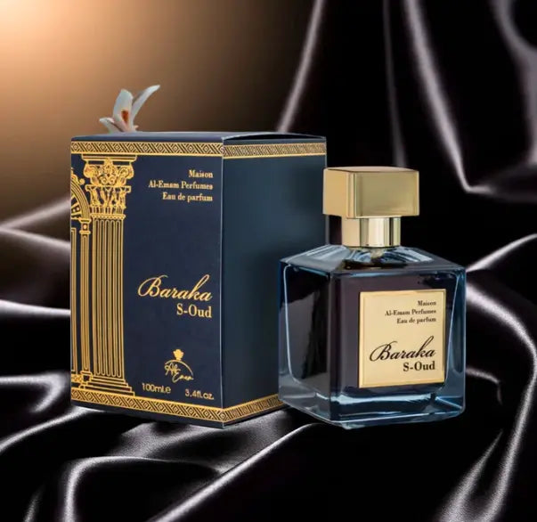Baraka_S_Oud_perfume_bottle_and_packaging_on_a_dark_fabric_background