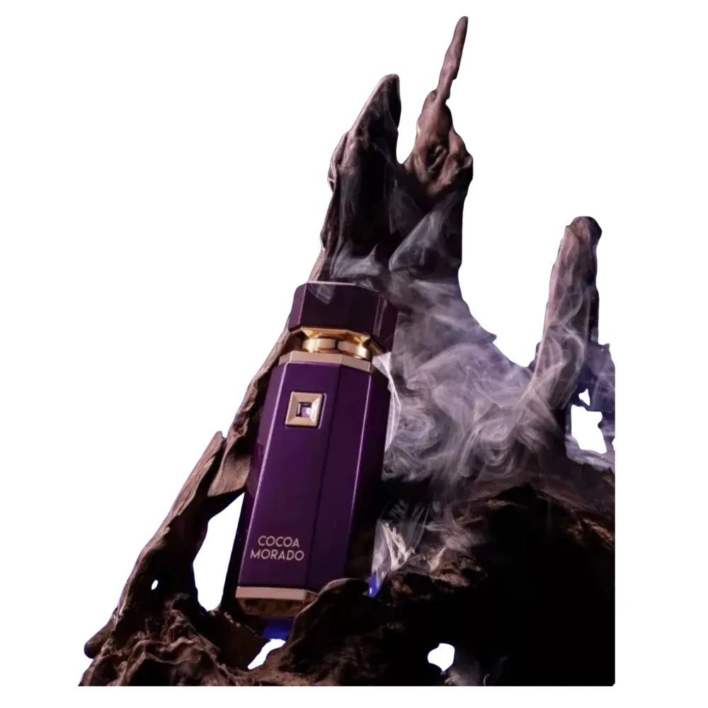 Purple vape device with gold accents on a dark background