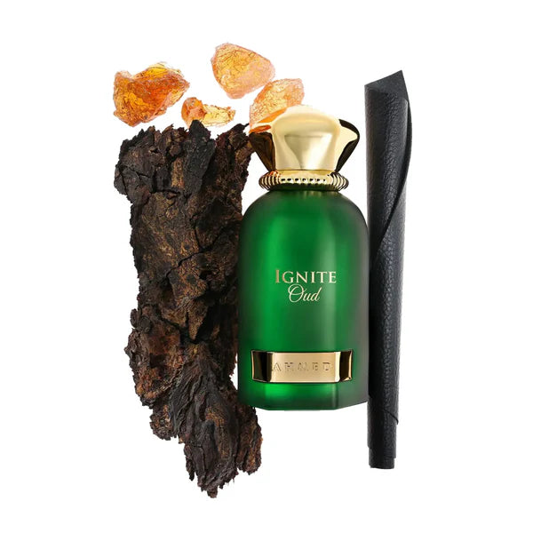 Green perfume bottle labeled 'Ignite Oud' with amber gums and a wooden element on a white background