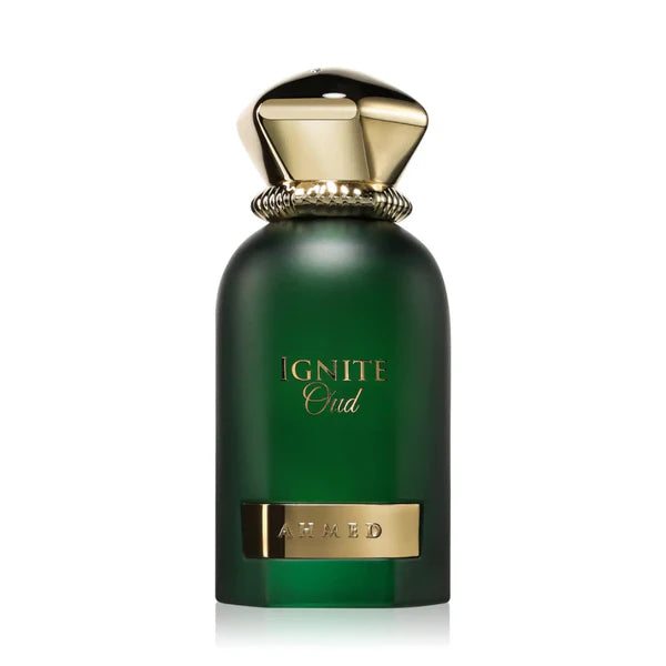 Green perfume bottle with gold cap and label on a white background