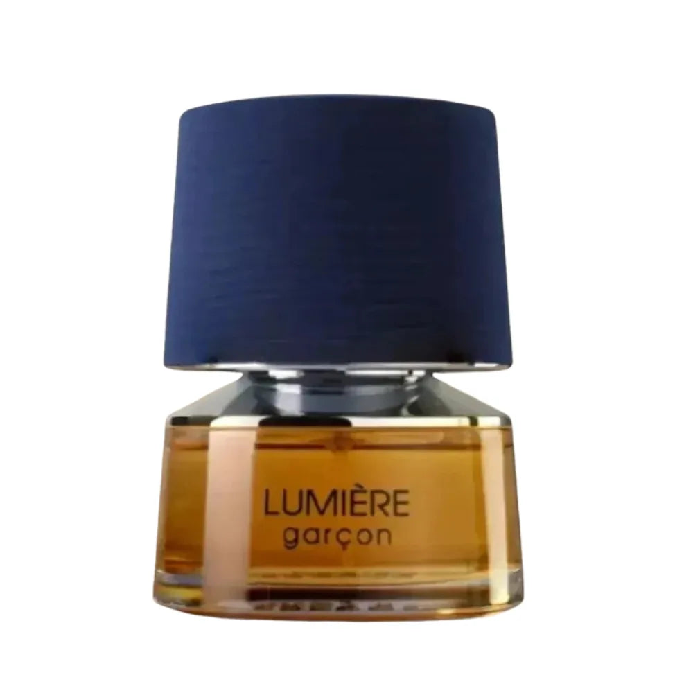 Perfume bottle labeled 'Lumérie garcon' with a dark blue cap on a white background