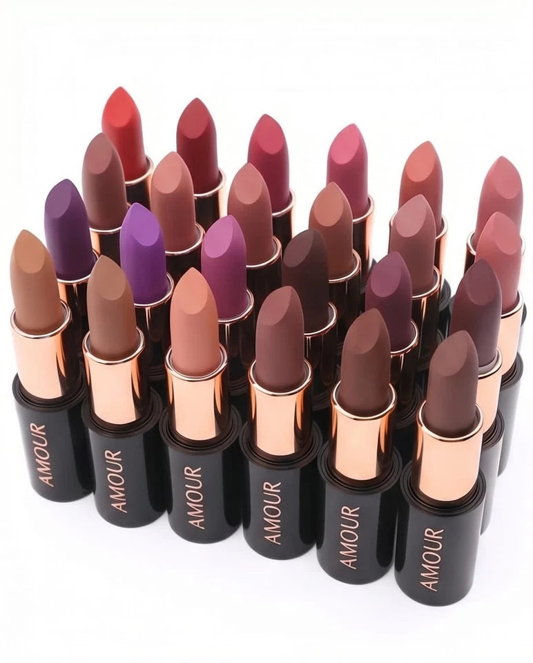 Collection of AMOUR lipsticks in various shades on a white background