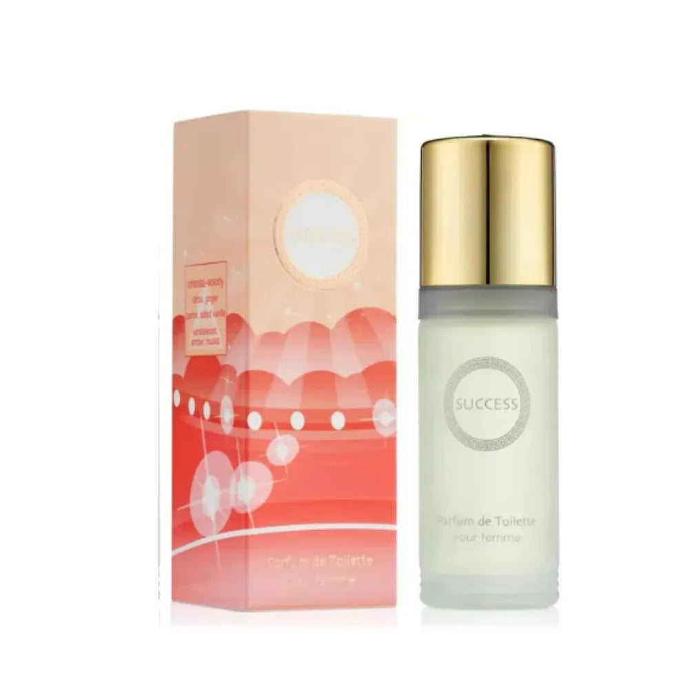 Perfume bottle with gold cap and matching box on a white background