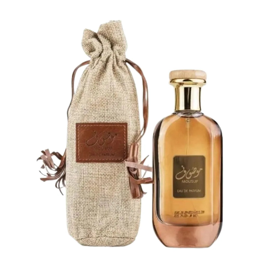 Perfume bottle with a drawstring bag on a white background