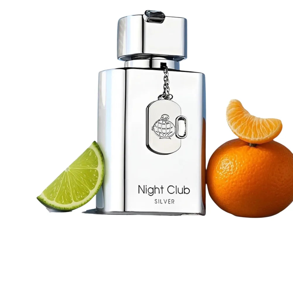 Silver perfume bottle labeled 'Night Club Silver' with lime and orange slices on a white background