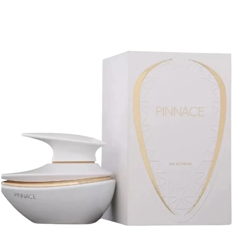 White and gold Pinnacle perfume bottle and packaging on a white background