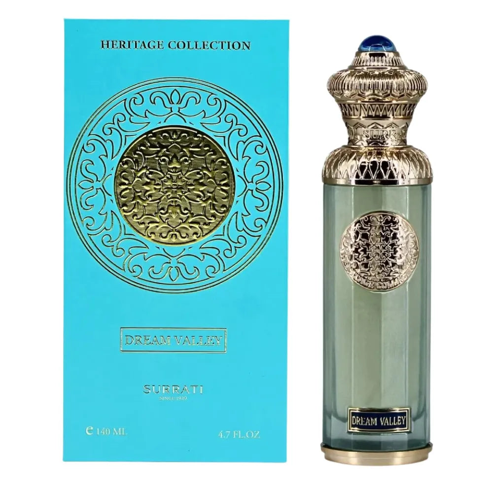 Perfume bottle and packaging with intricate designs on a white background