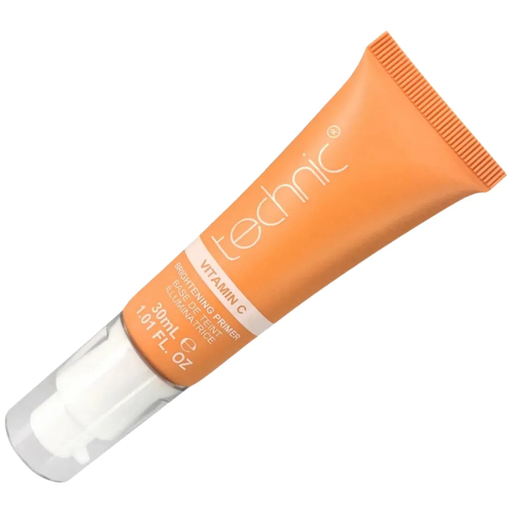 Orange cosmetic tube with 'technic' branding on a white background