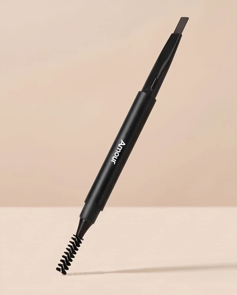 Black eyebrow pencil with bristle tip on a beige background
