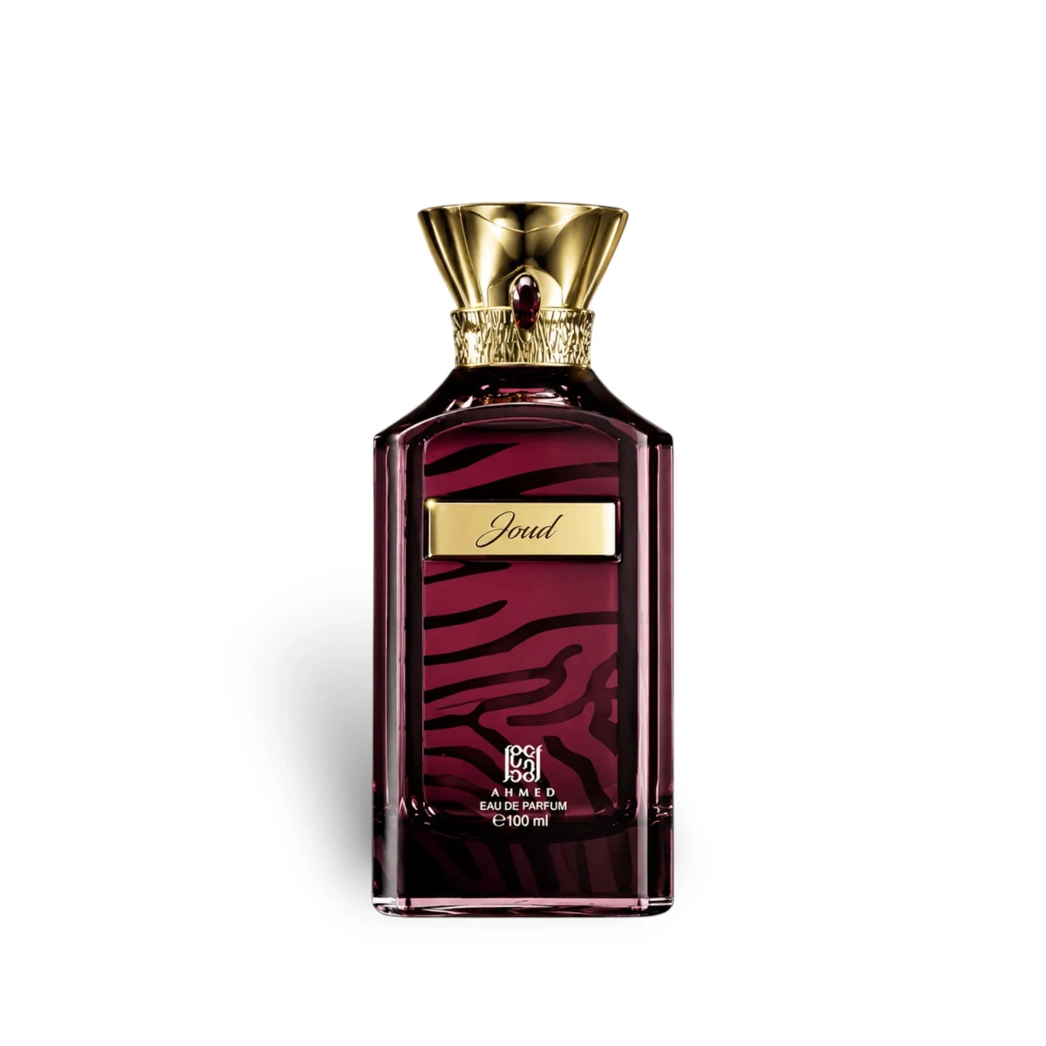Perfume bottle with gold cap and maroon design on a white background